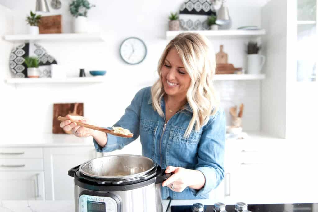 Kristen spooning her noodles out of the Instant Pot