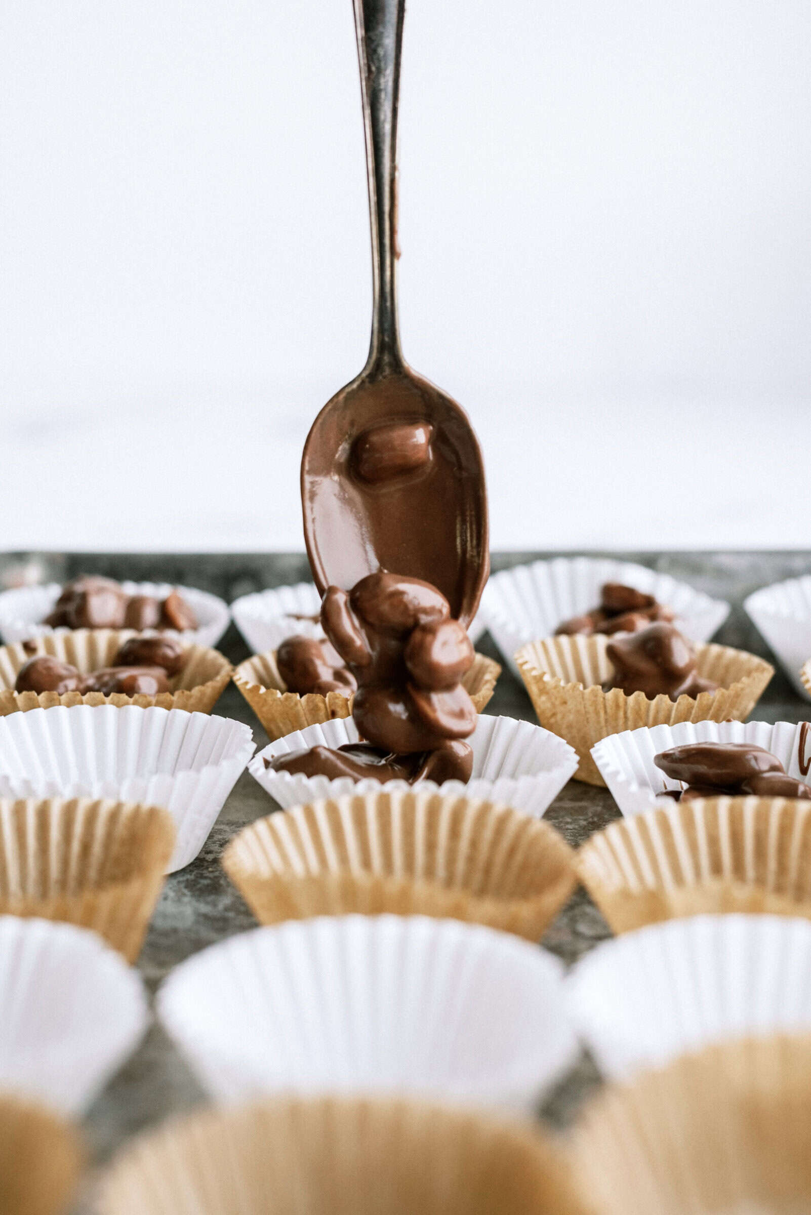 instant pot nut clusters being dropped into liners