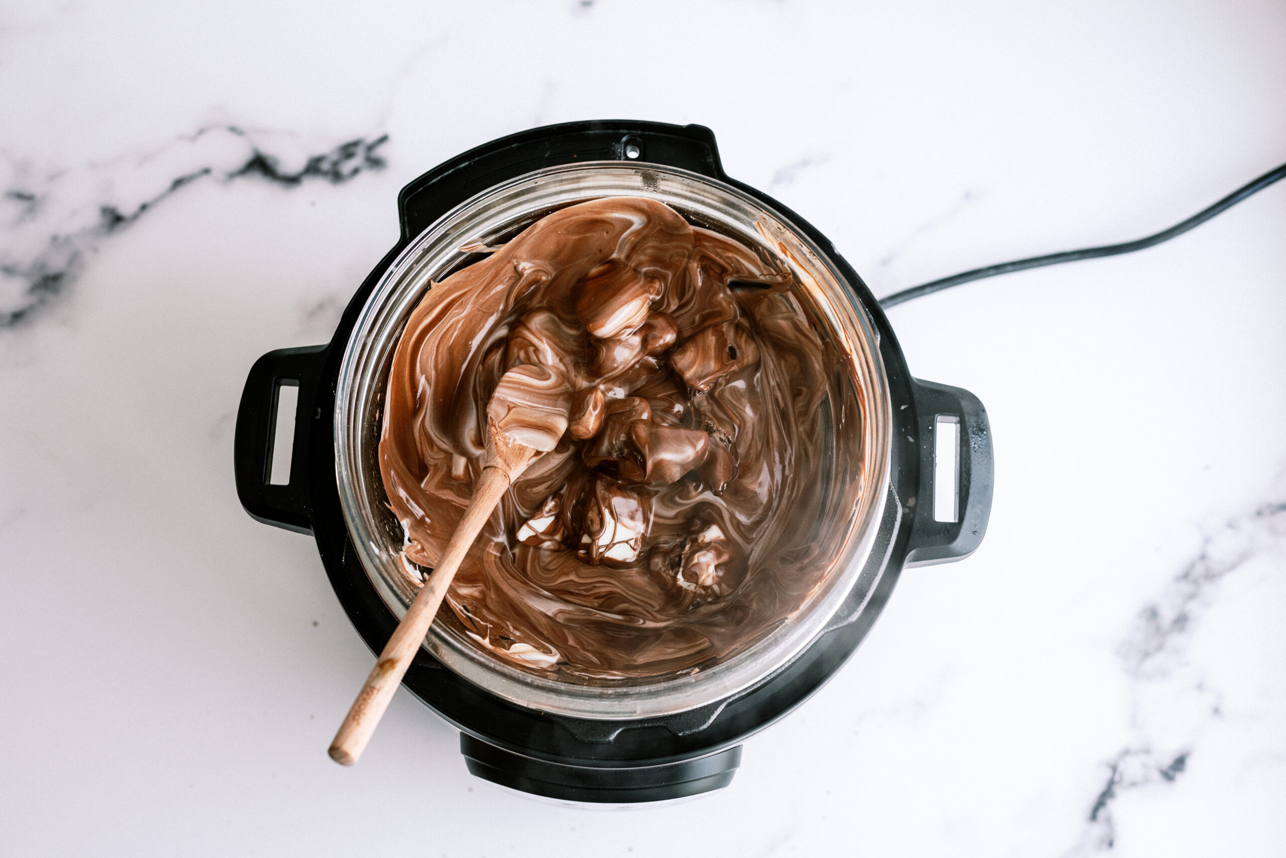 melted chocolate on top of instant pot in a bowl