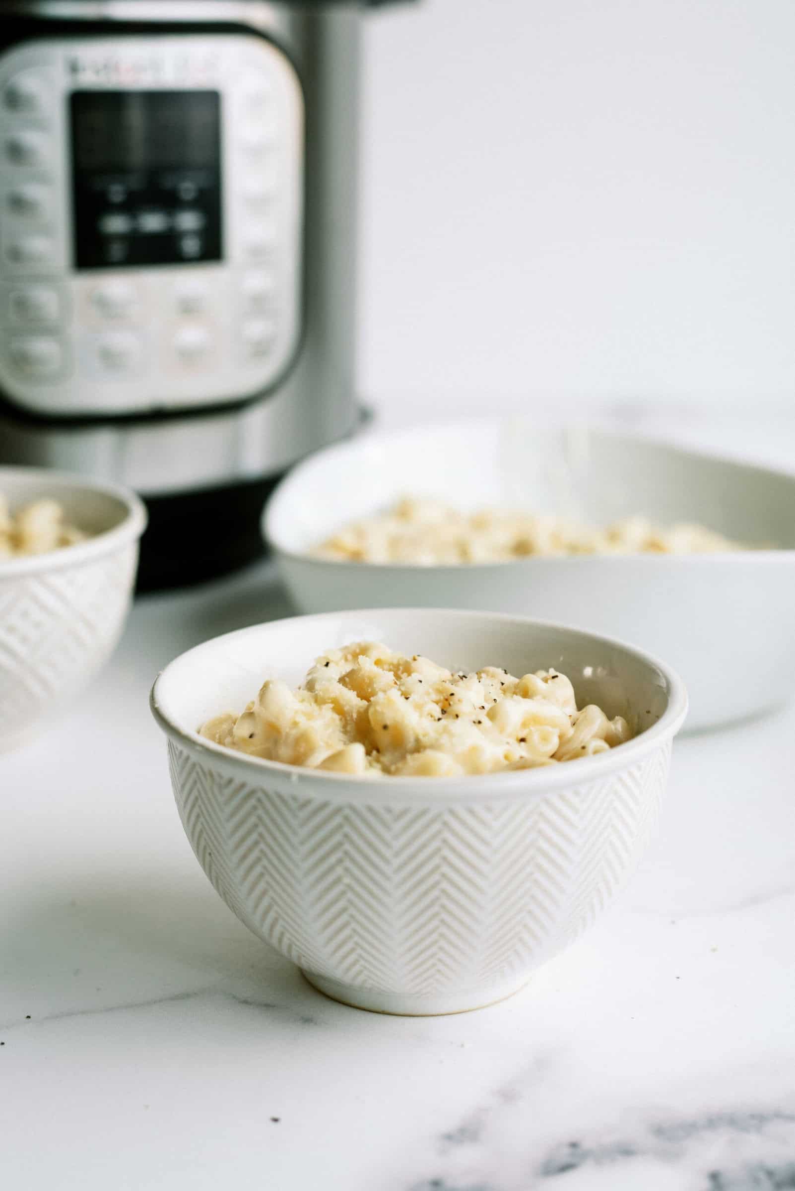 bowl of macaroni in from of instant pot