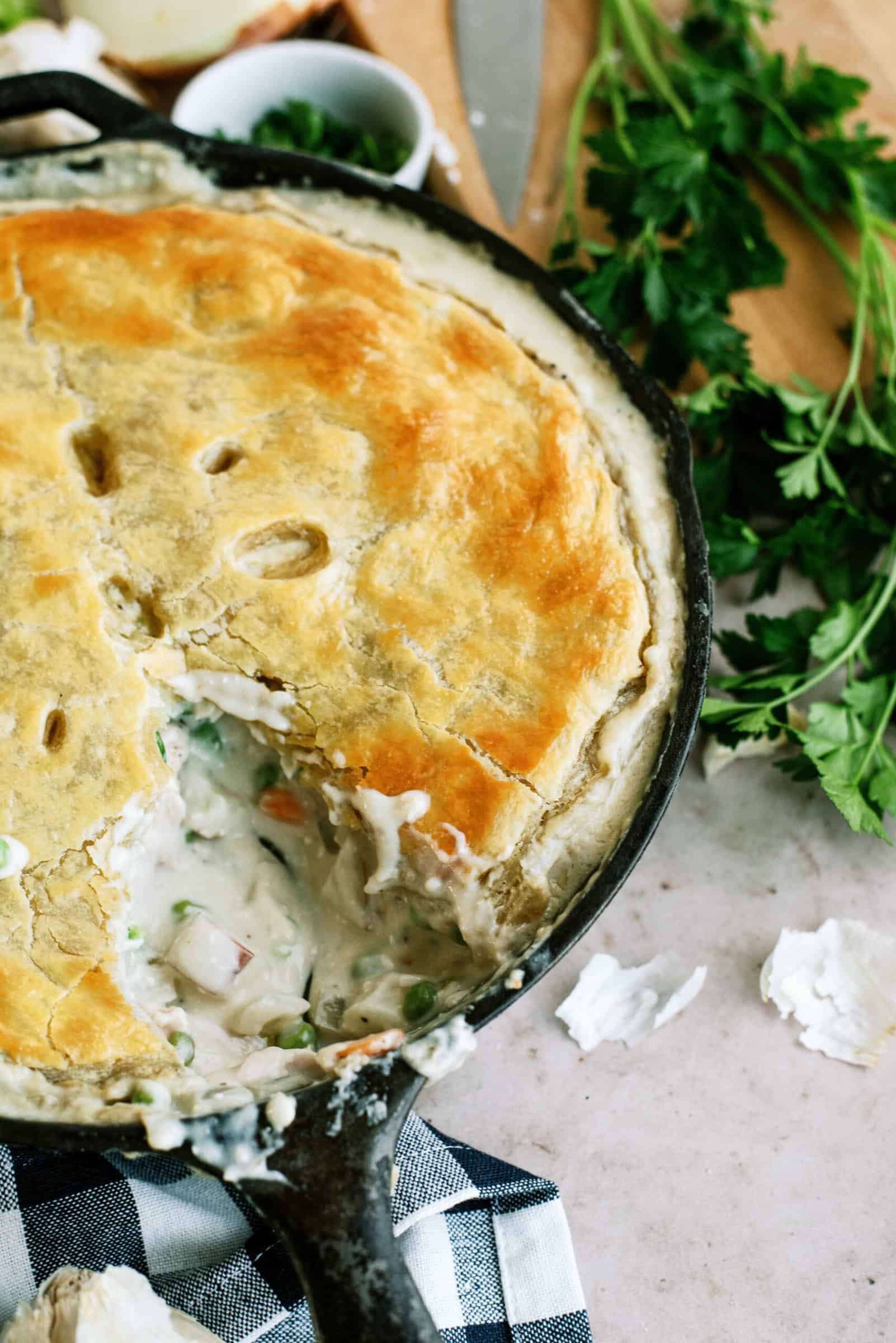 Baked pot pie with a slice removed. 