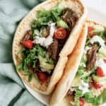 Instant Pot Beef Gyros on a white plate.