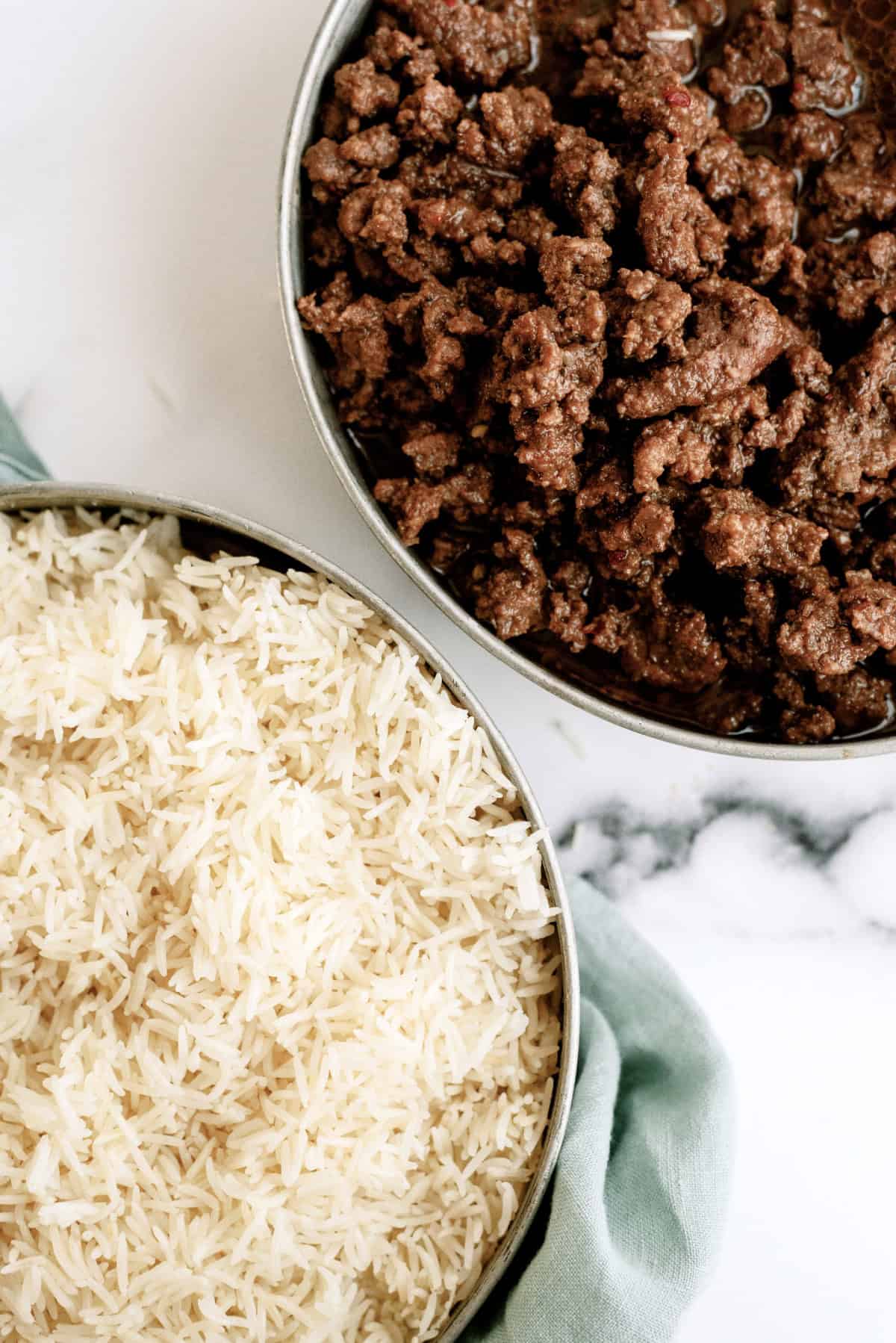 ground beef with rice in bowls from the Instant Pot