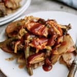 slow cooker hobo dinner with bbq sauce on top