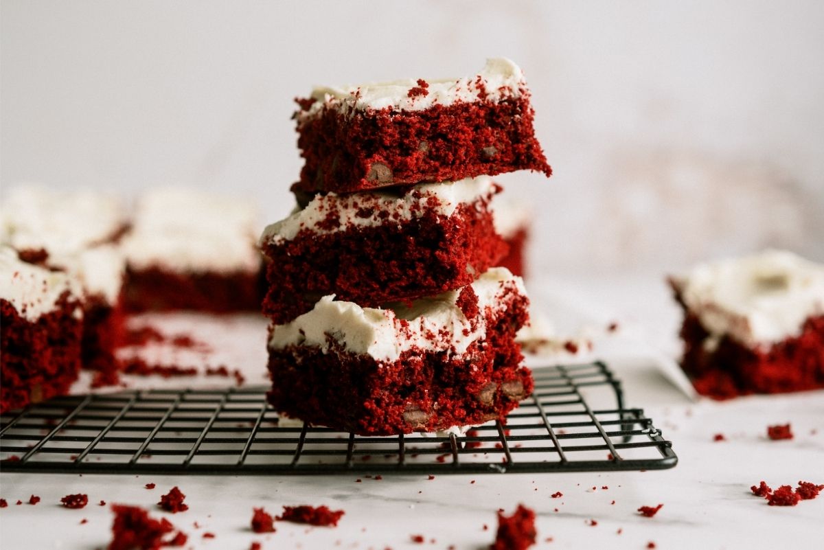 Red Velvet Brownies with White Chocolate Buttercream Frosting on Cooling Rack