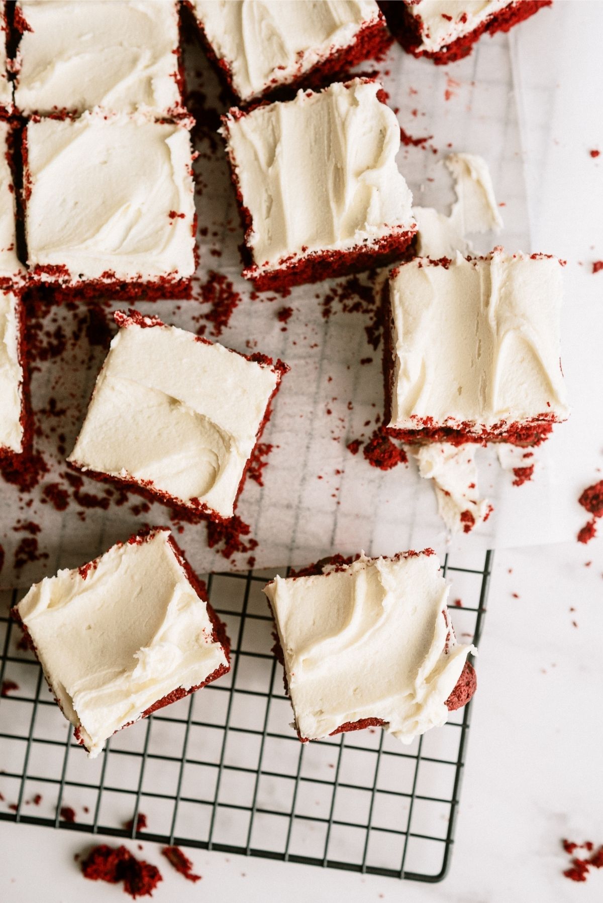 Red Velvet Brownies with White Chocolate Buttercream Frosting on cooling rack