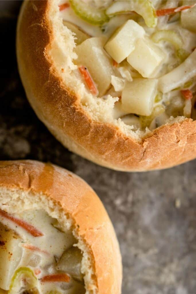 Two Homemade Bread Bowls filled with soup.