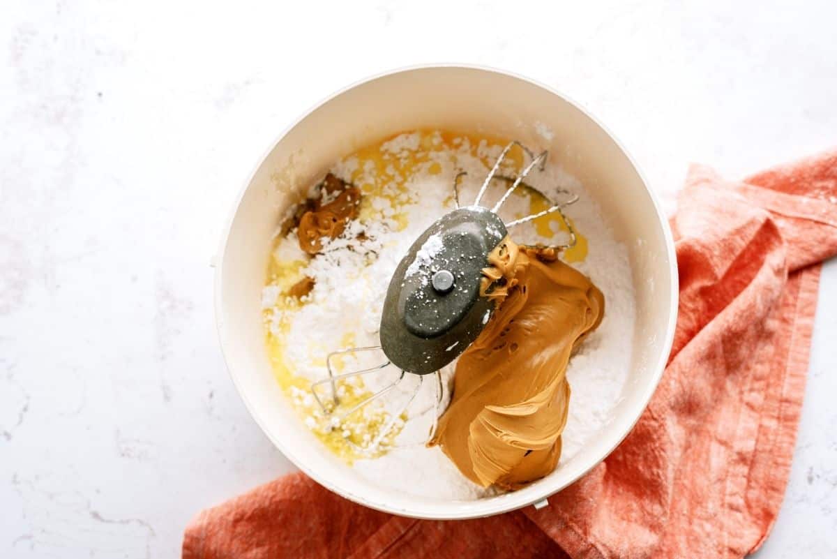 Ingredients for Homemade Reese's Eggs in mixing bowl