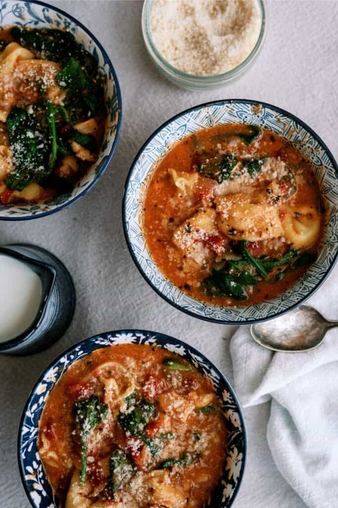 Two bowls of Instant Pot Creamy Tortellini Soup.