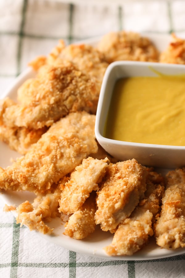 This image has an empty alt attribute; its file name is Parmesan-Sesame-Chicken-Strips-plated-2.jpg