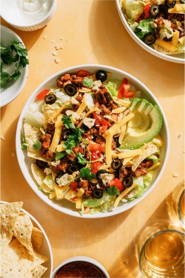 Top view of Taco Salad in a bowl with toppings.