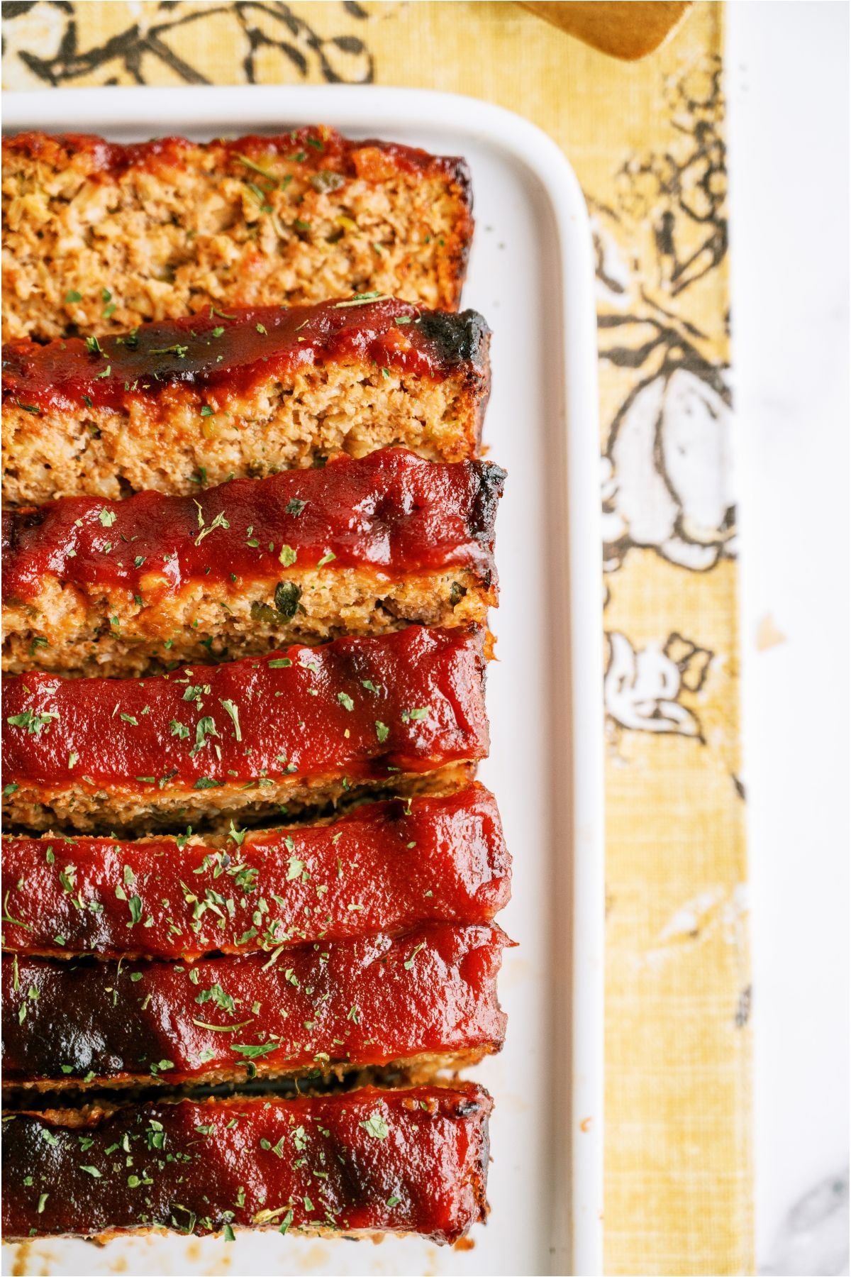 Top view of Easy Turkey Meatloaf on a serving plate sliced.