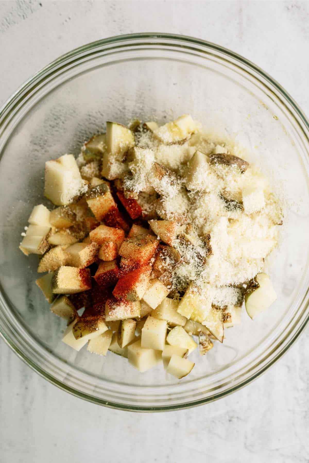 Ingredients for Instant Pot Air Fryer Roasted Potatoes in mixing bowl