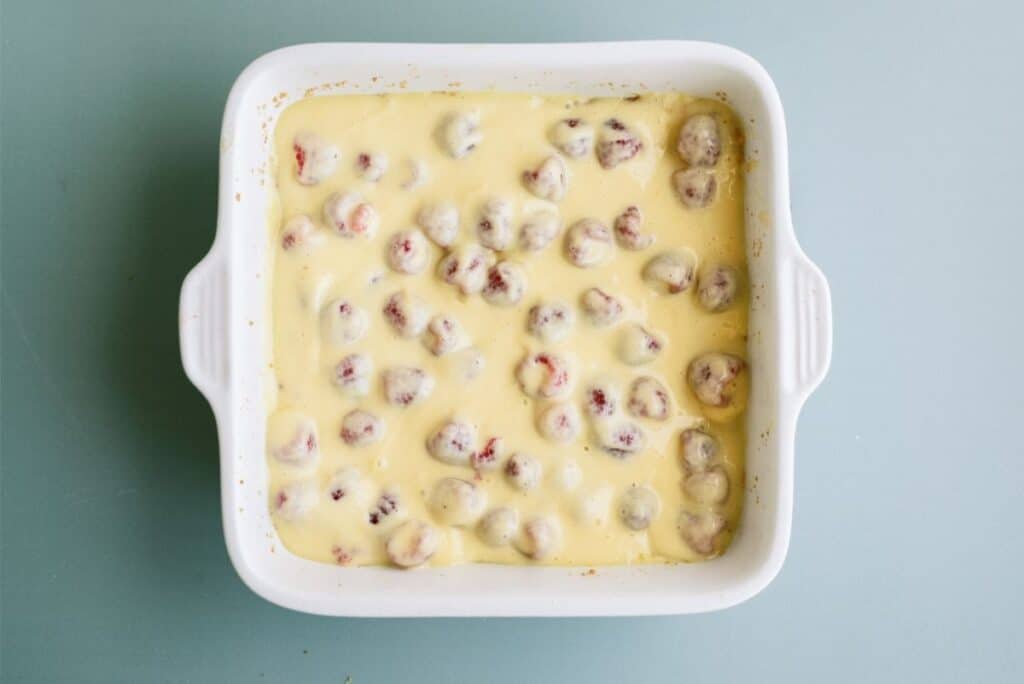 Lemon Raspberry Bar batter in a square baking dish.