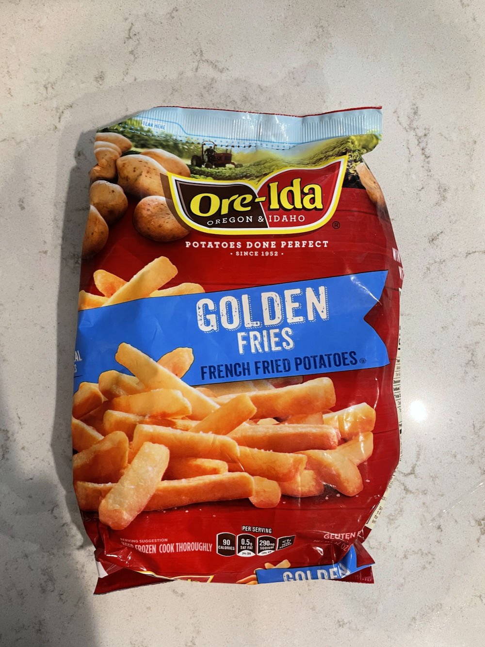 frozen french fries in a bag ready to be cooked