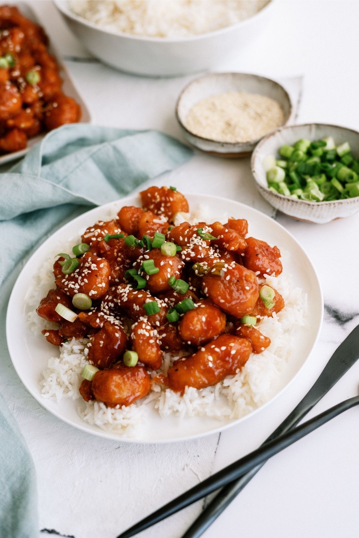 Instant Pot Sticky Chicken served over rice on white plate