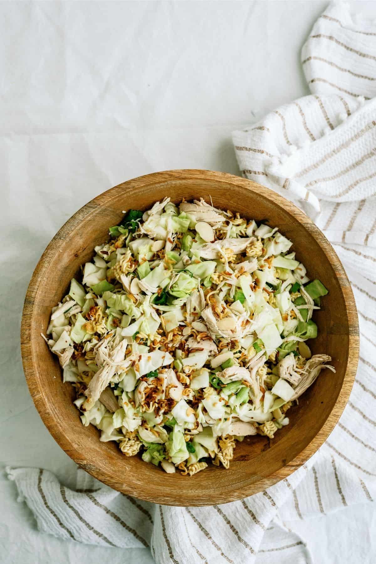 Ramen Noodle Oriental Chicken Salad in a wooden bowl