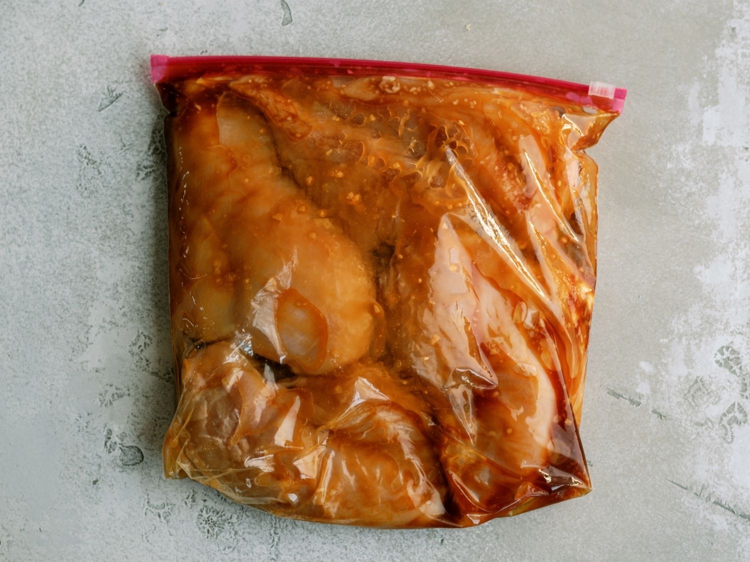 5 Star Grilled Teriyaki Chicken marinating in ziploc bag