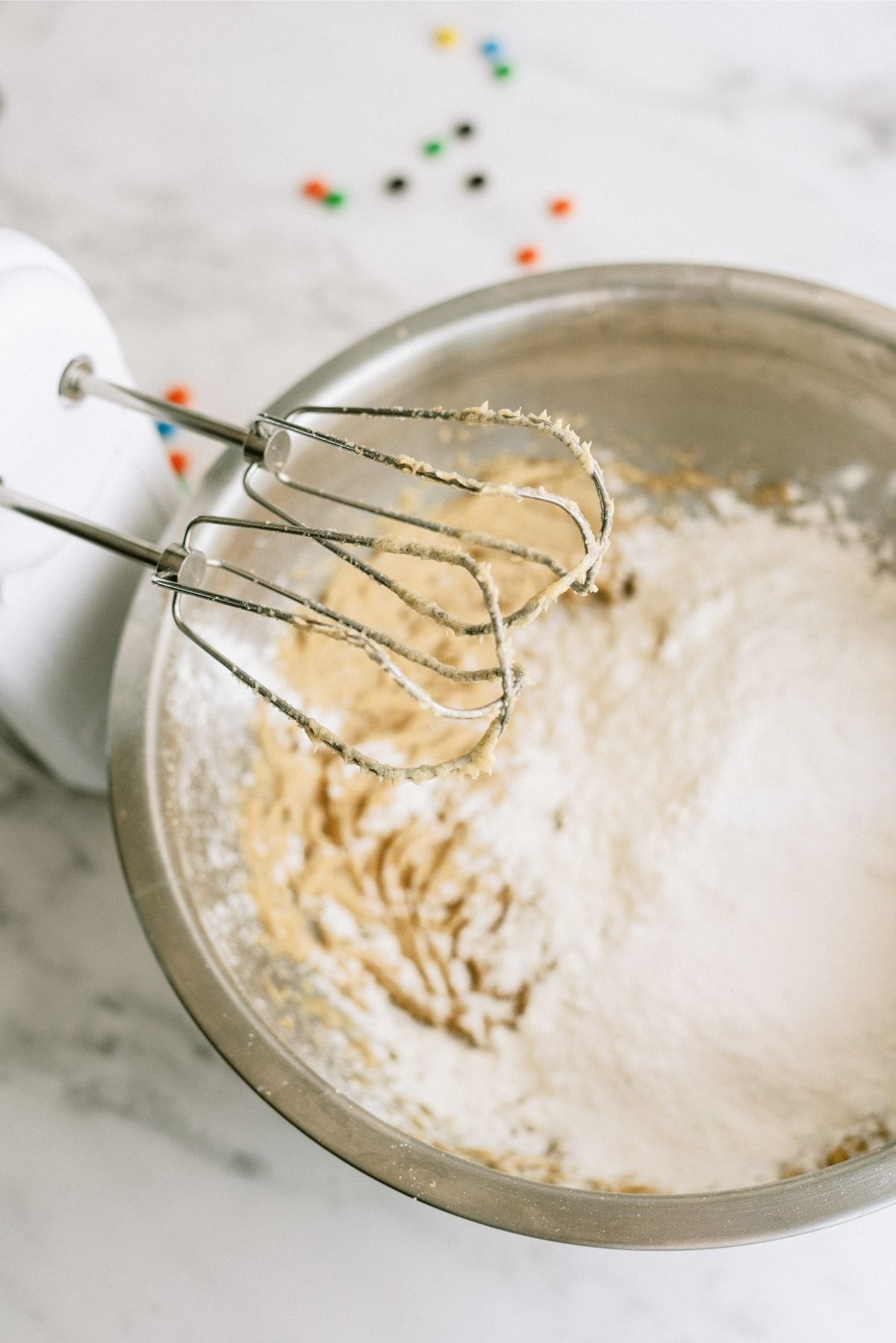 stand mixer mixing together the unsalted butter, granulated sugar, and brown sugar