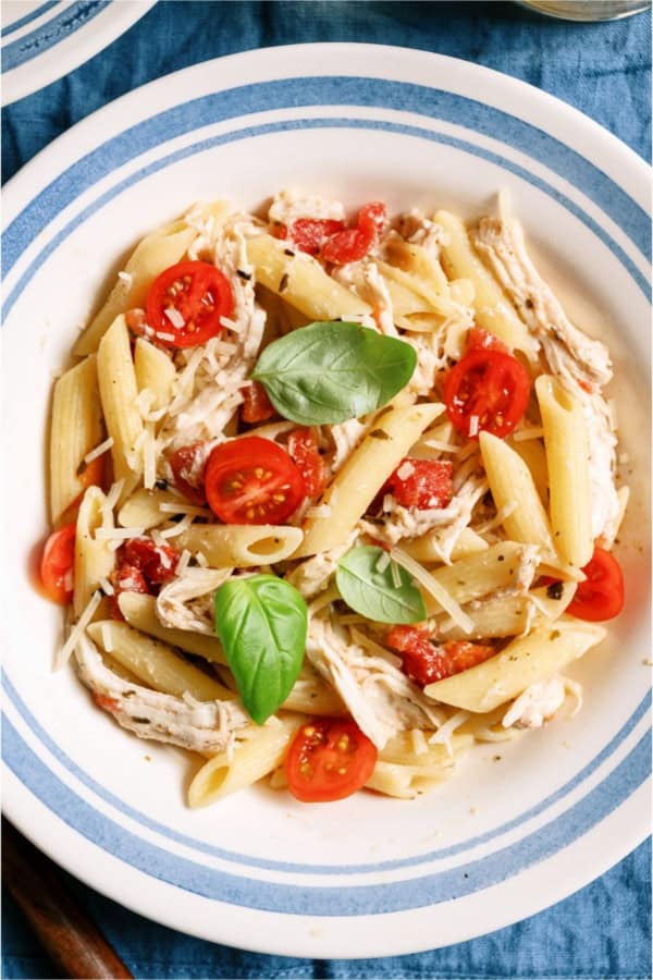Top view of a bowl of Slow Cooker Chicken Alfredo with Pesto.