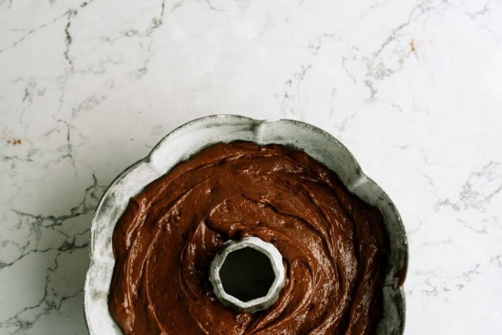 Top view of Triple Chocolate Bundt Cake batter in bundt cake pan.