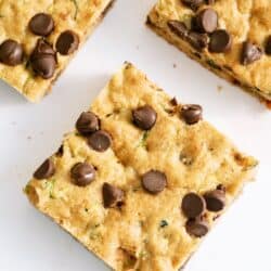 3 Chocolate Chip Zucchini Bars on a white background.