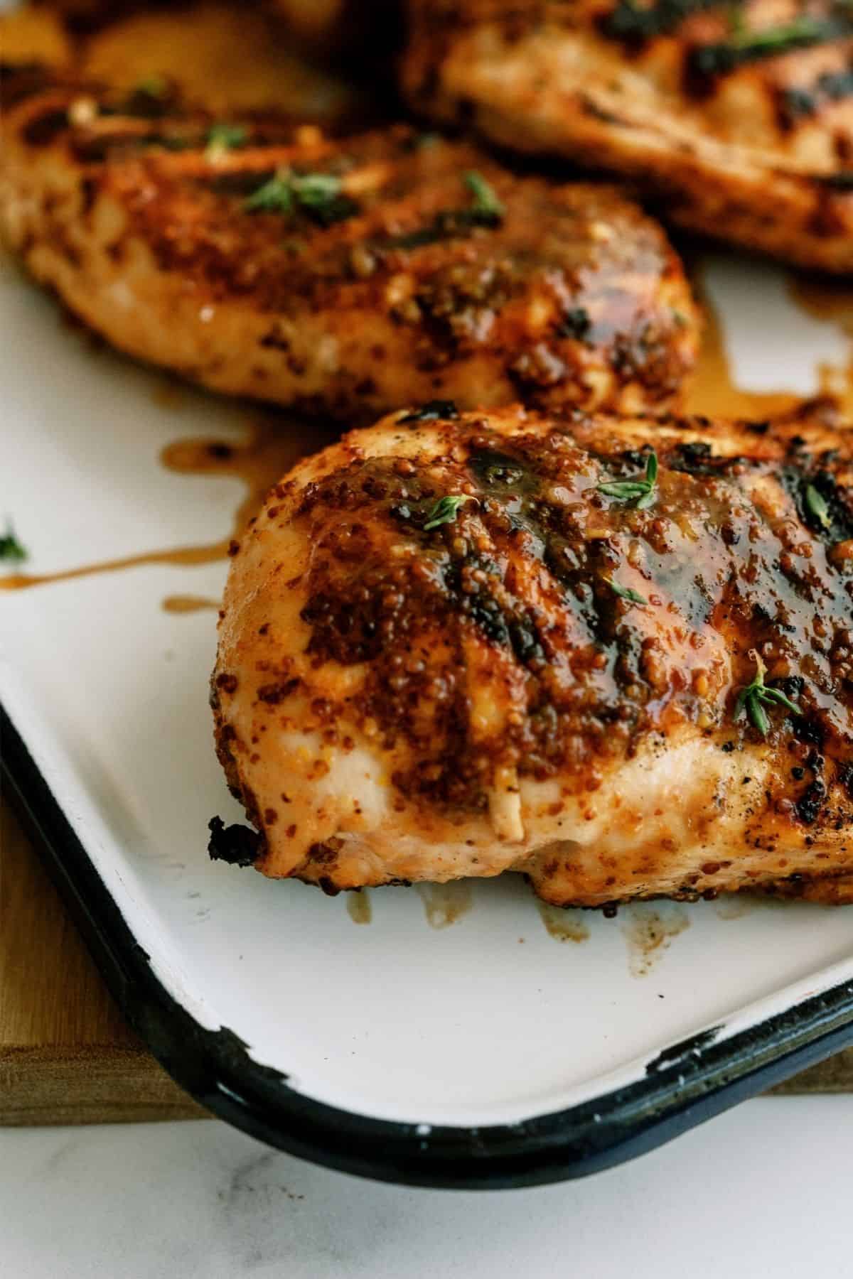 Close up of Grilled Honey Mustard Chicken on a serving platter