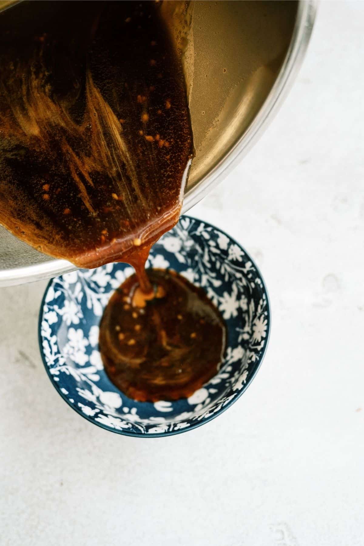 Teriyaki Mixture being poured into a bowl