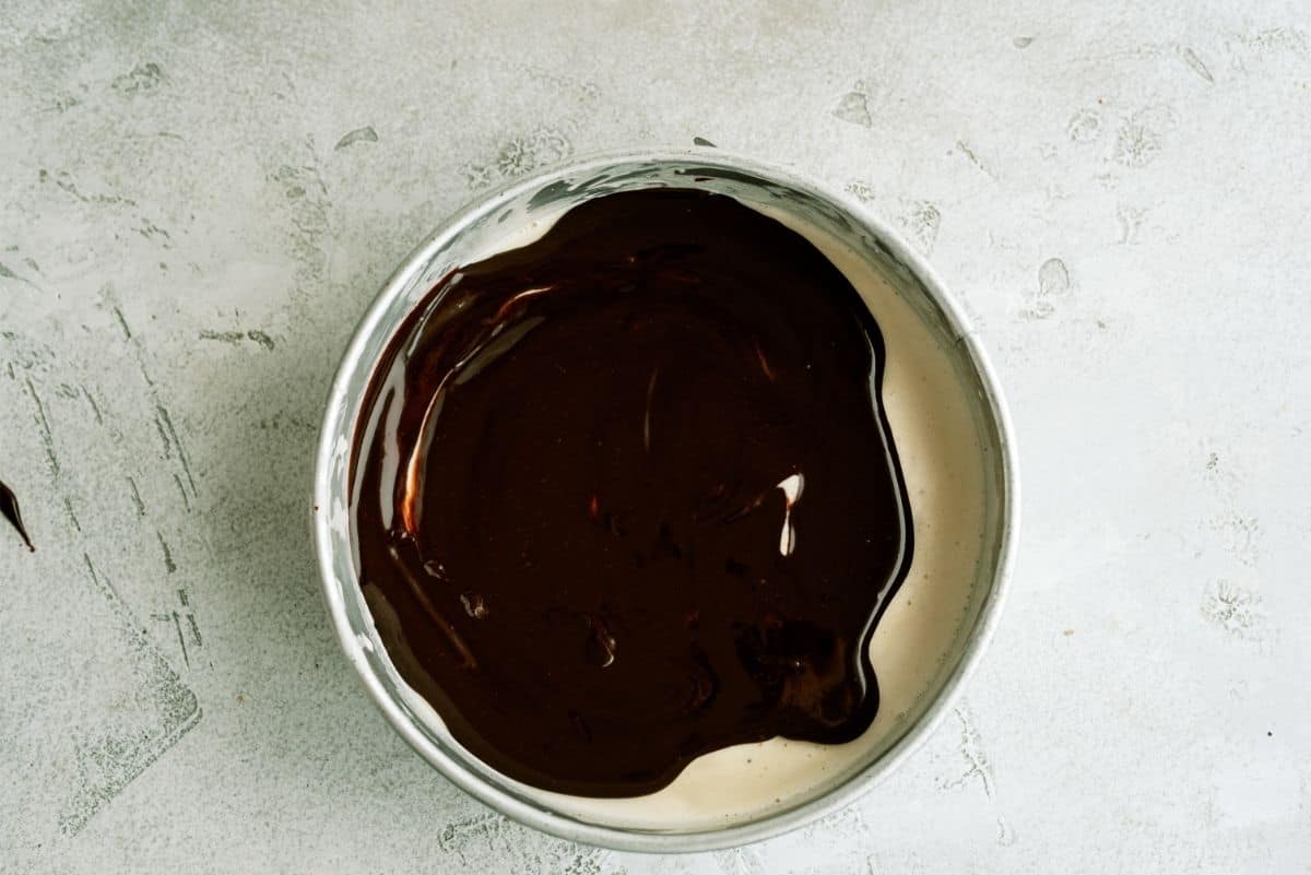 Hot fudge poured over ice cream layer