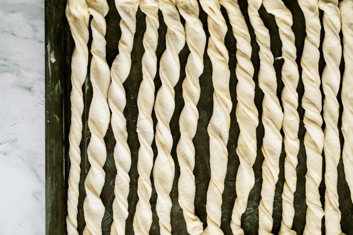 Dough strips twisted and put on a baking sheet