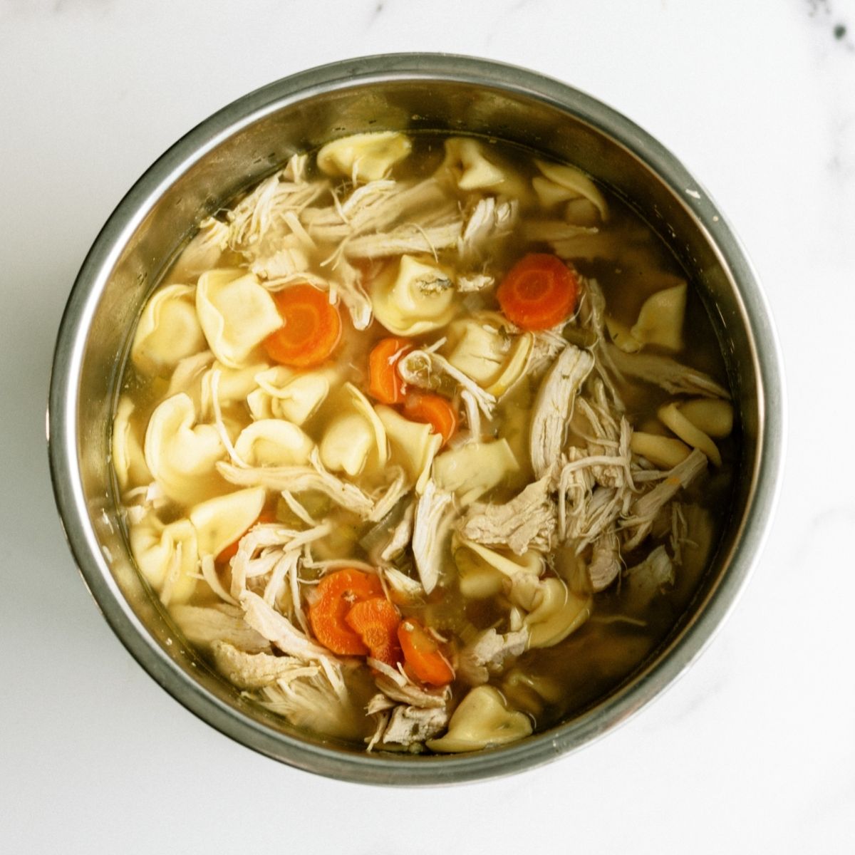 Cooked Instant Pot Chicken Tortellini and Vegetable Soup in Instant Pot Insert