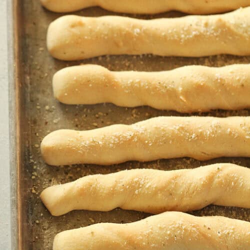 Baked Homemade Breadsticks on a sheet pan.