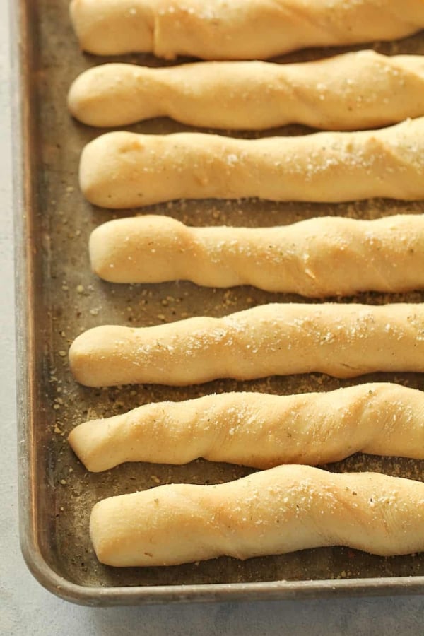 Baked Homemade Breadsticks on a sheet pan.