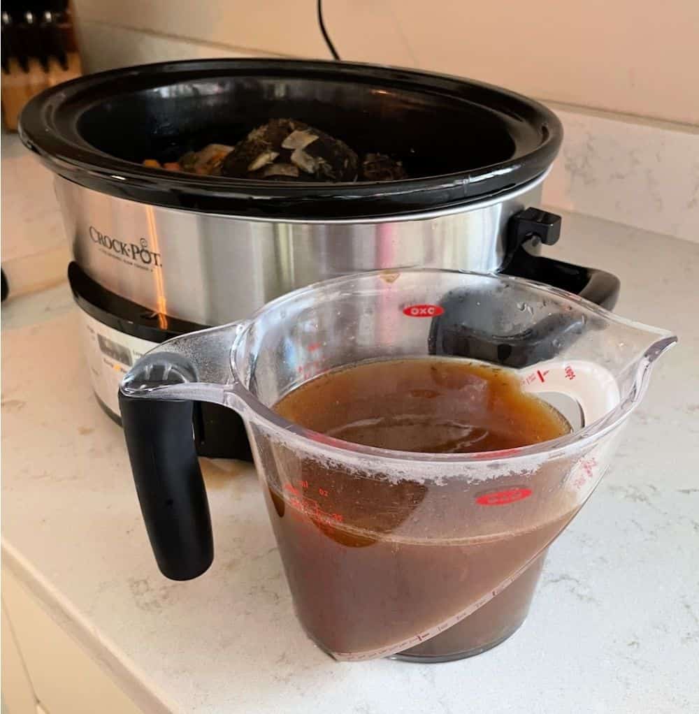 drippings removed from slow cooker to make gravy