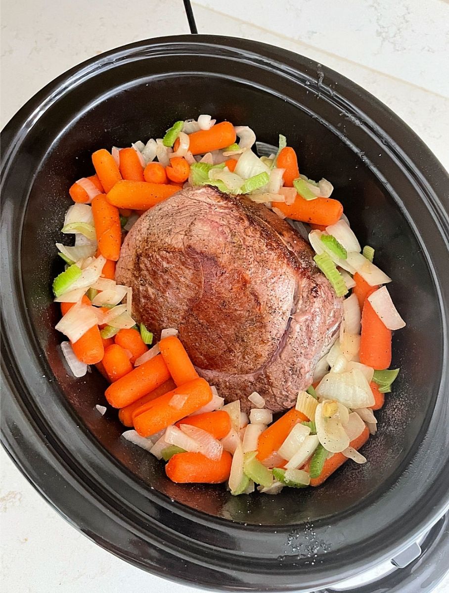 add vegetables around your roast in the slow cooker