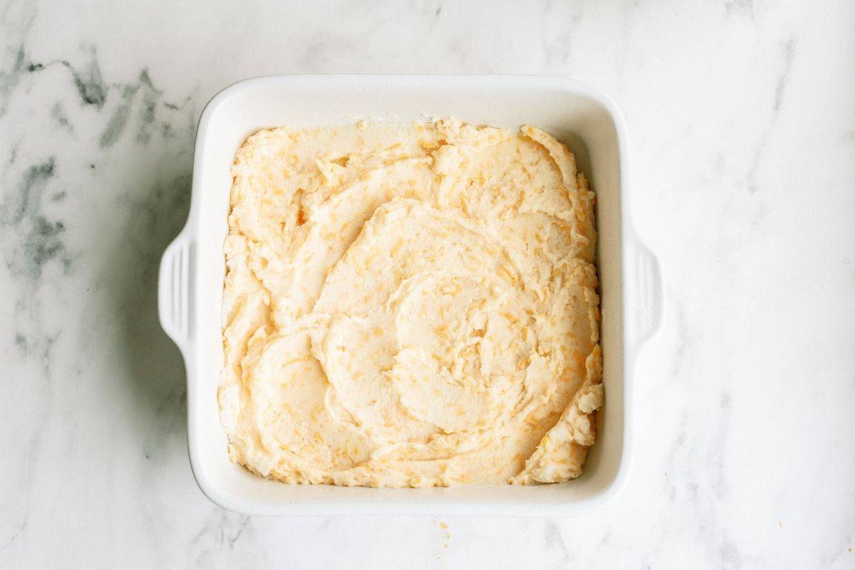 Mashed potato mixture pressed into casserole dish