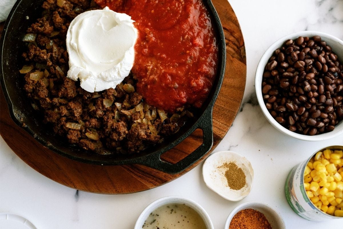 Skillet with meat, salsa, sour cream 