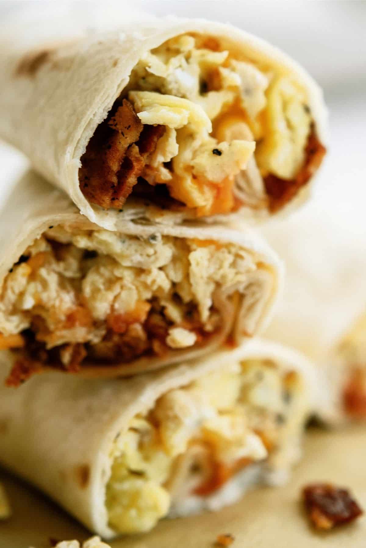 Freezer Breakfast Burritos stacked vertically