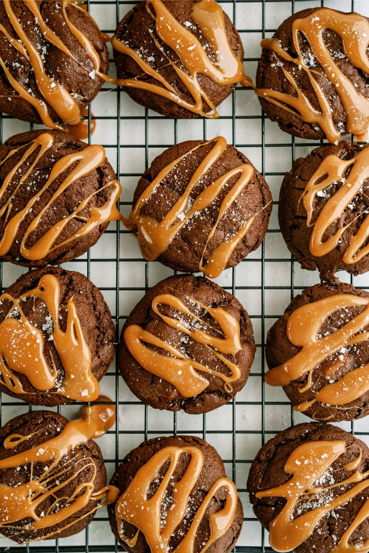 Salted Caramel Chocolate Cookies on a cooling rack.