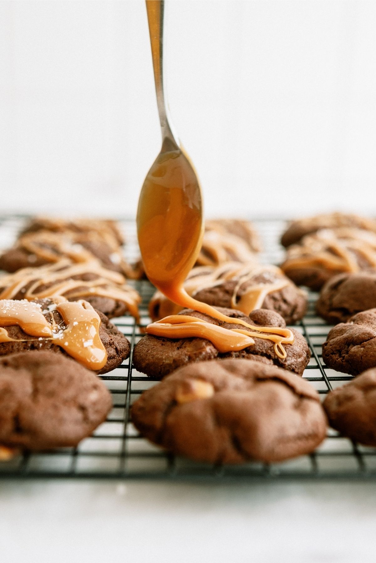 Drizzle caramel on baked and cooled Salted Caramel Chocolate Cookies