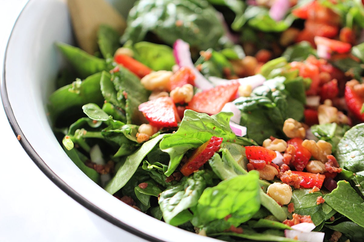 Close up of Strawberry Spinach Salad and Homemade Poppy Seed Dressing
in a bowl