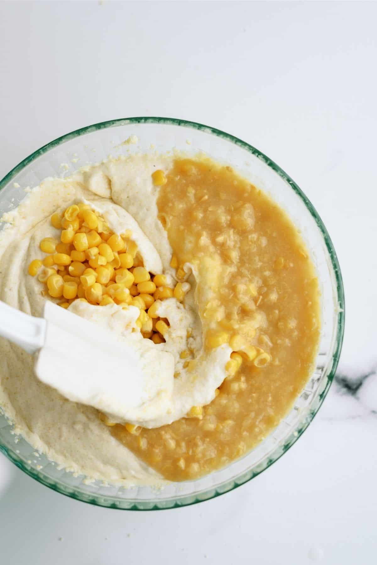 Folding corn into the casserole mixture