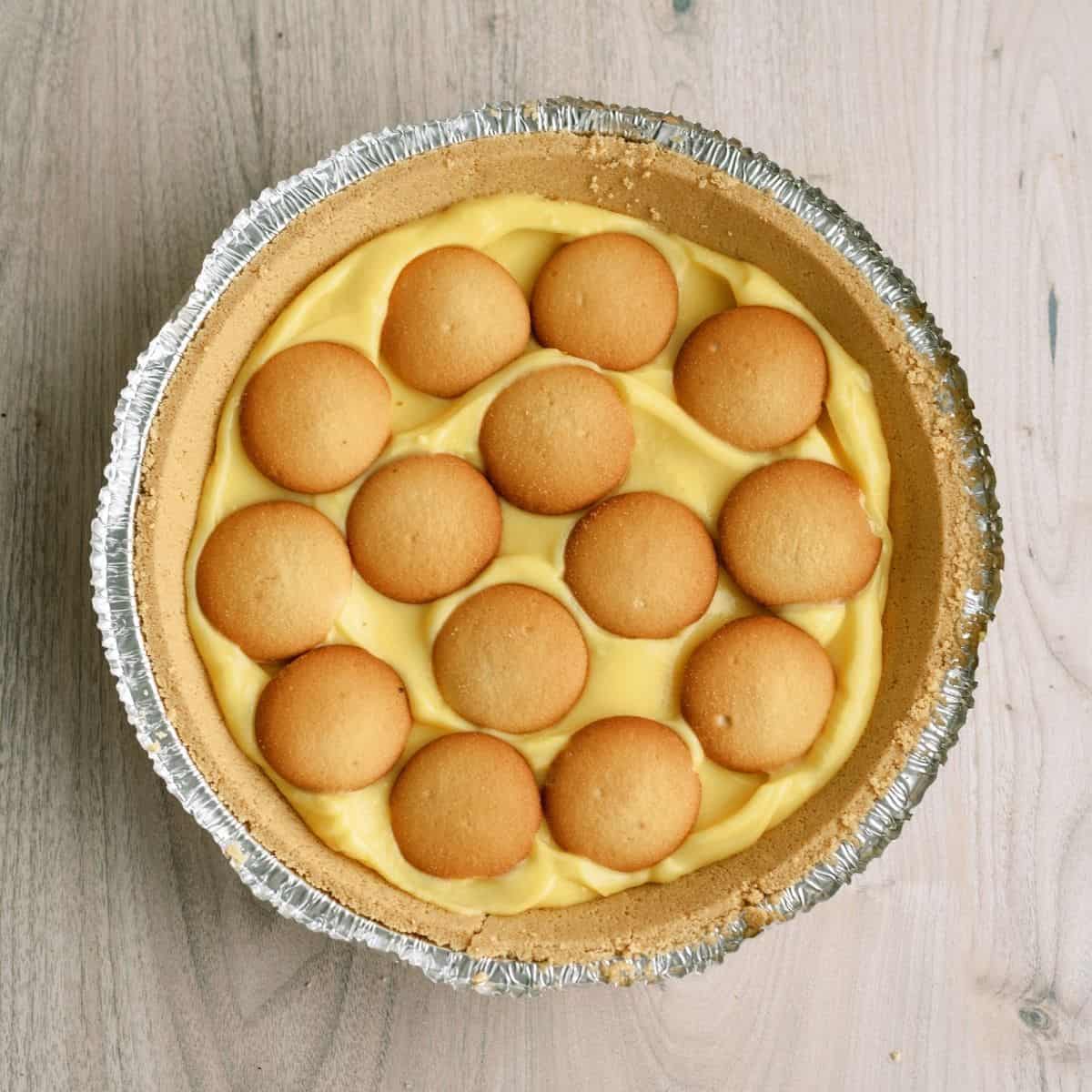 A layer of vanilla wafers on top of the pudding mixture