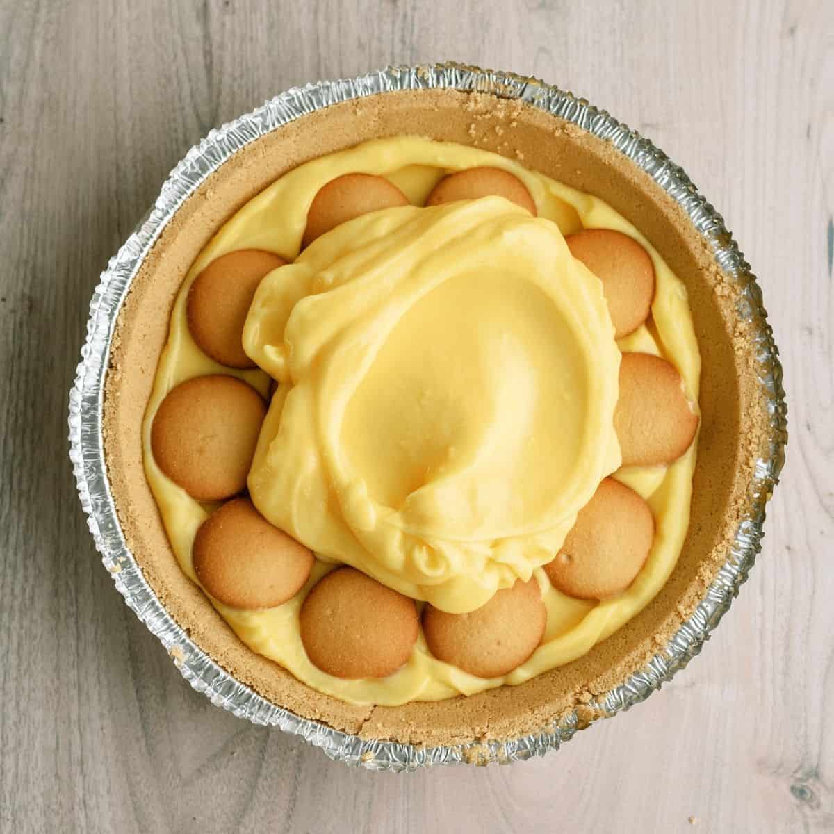 Remaining pudding mixture spread on top of vanilla wafer layer