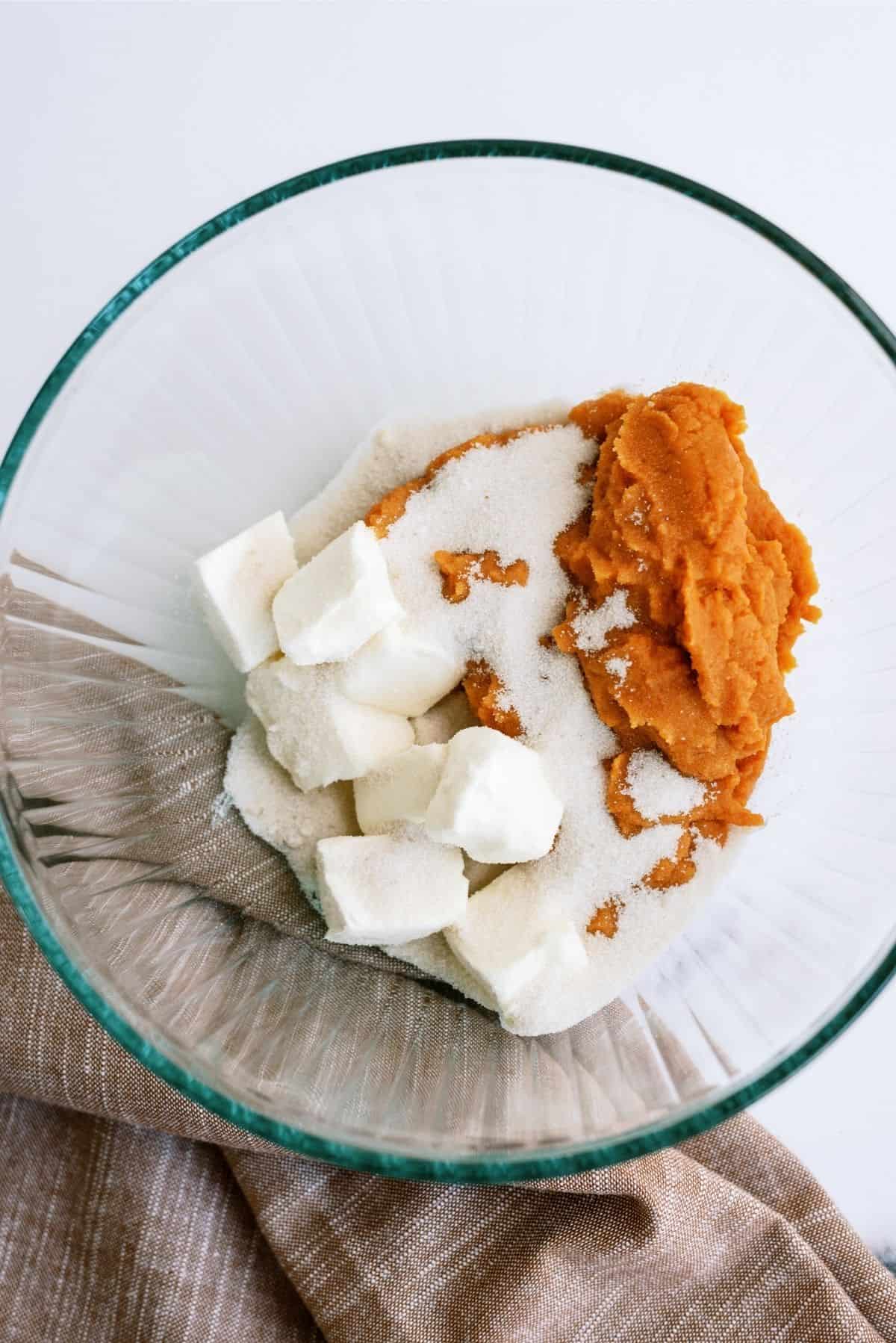 Filling ingredients for Mini Pumpkin Pie Crescents in a glass mixing bowl