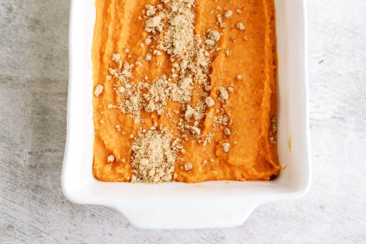 Sprinkle flour mixture on top of sweet potatoes in pan