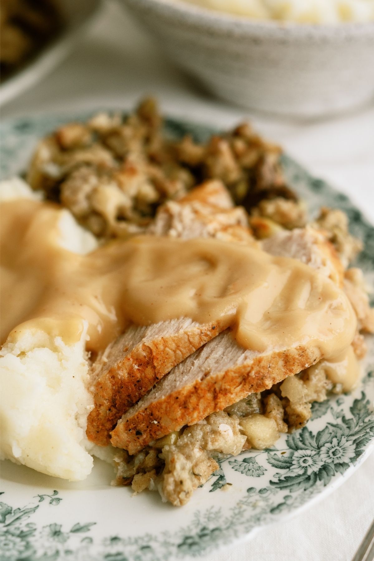 Slow Cooker Turkey and Stuffing with mashed potatoes on a plate