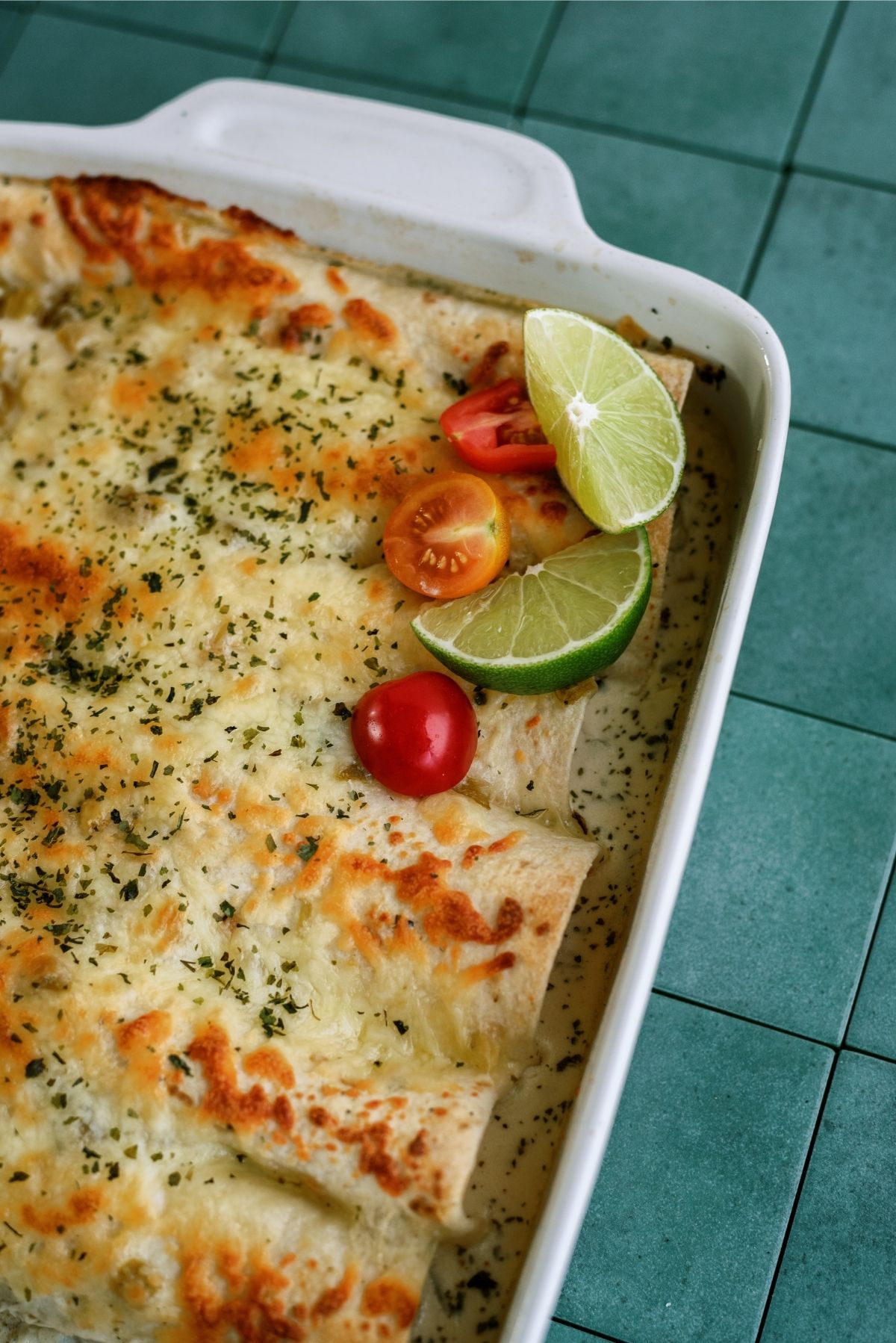 Baked Turkey Enchiladas in the pan with toppings