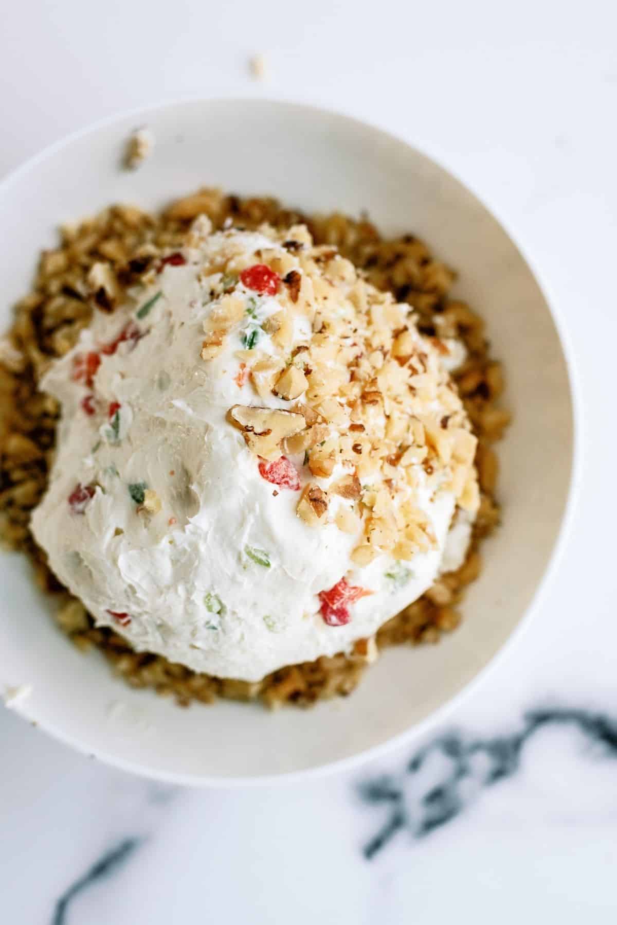 Cream cheese ball rolled in walnuts