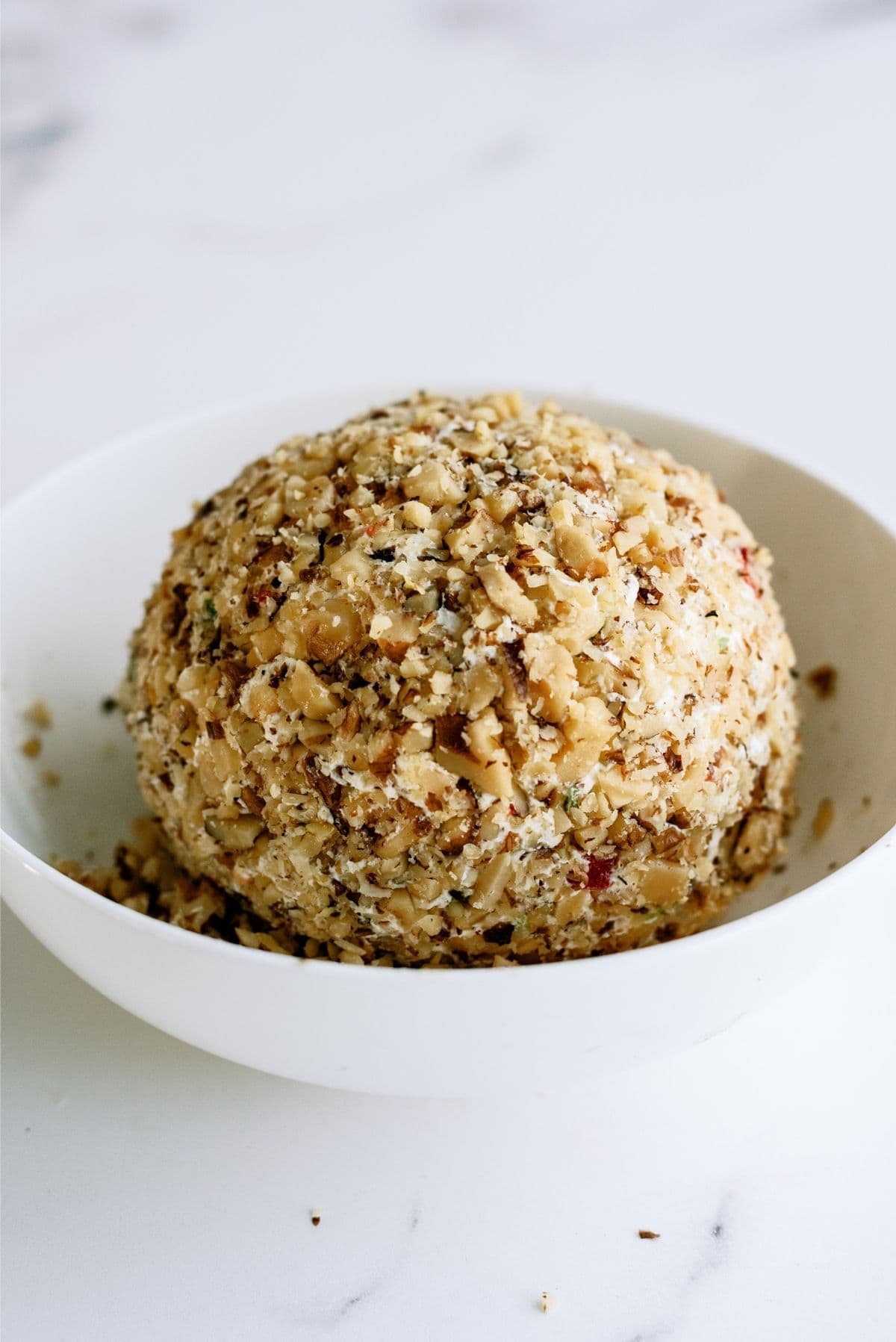 Grandma’s Holiday Cheese Ball in shallow dish